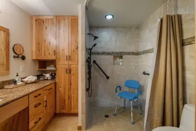 ADA Compliant Bathroom comes with a Shower Chair