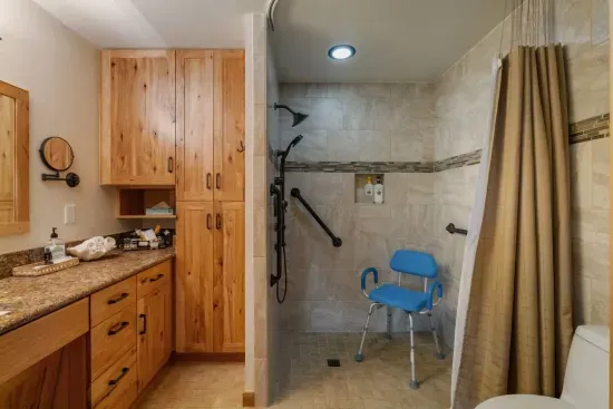 ADA Compliant Bathroom comes with a Shower Chair
