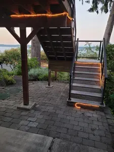 Motion lights turn on for guests arriving after dark and parking in the driveway.  Stairless entry is available for guests who park in the carport.