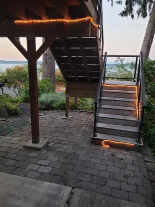 Motion lights turn on for guests arriving after dark and parking in the driveway.  Stairless entry is available for guests who park in the carport.