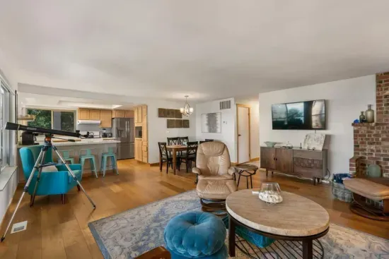 Filled with abundant natural light, you’ll find the living room a warm and inviting space.