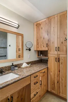ADA sink in the ensuite main bedroom bathroom