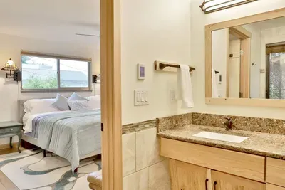 A spacious ensuite bathroom in the main king bedroom.