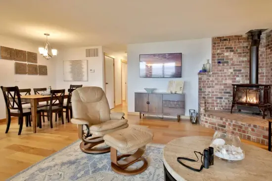 Filled with abundant natural light, you’ll find the living room a warm and inviting space.