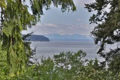Mountain and water views from the covered and heated deck.