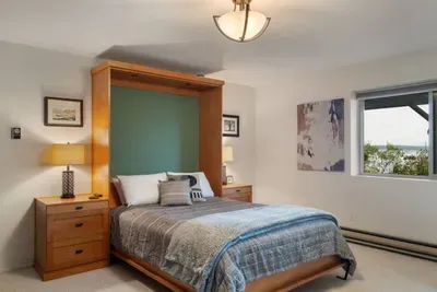 Queen Bedroom in Daylight Basement Suite