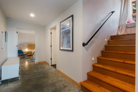 The ADA compliant bedroom has a stairless entry from the front door.