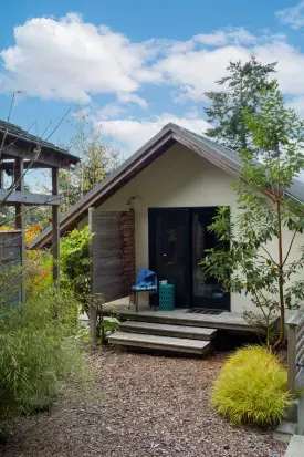 Enjoy a morning coffee on the private deck off of the second-floor King bedroom which overlooks the serene back garden.