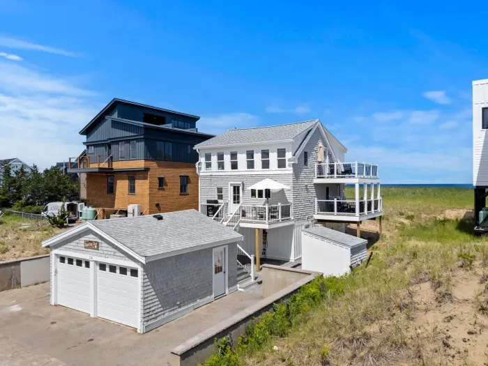 Spacious beach house with multiple decks, dune views, and a 2-car garage