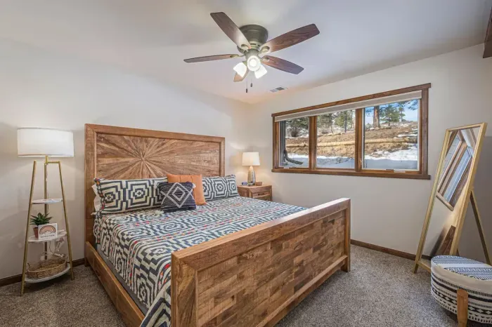 Bedroom 3 has a king-size bed, memory foam mattress, ceiling fan, and mirror.