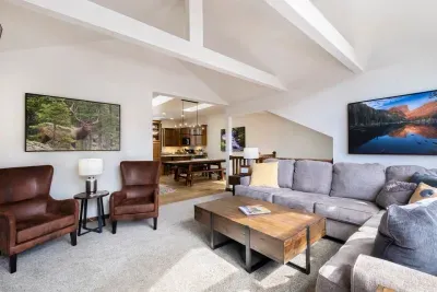 The open concept connects the living room with the dining/kitchen area.