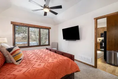 Primary suite with 55" smart tv for your viewing pleasure.