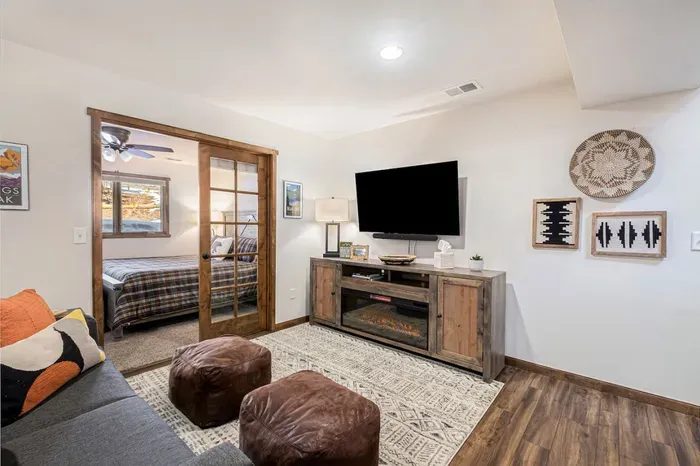 In the lower-level family room, there is a
Smart Tv & fireplace for your enjoyment.