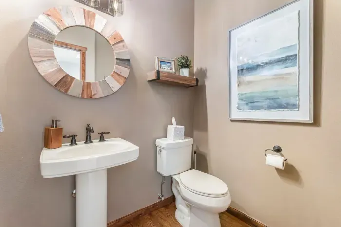 Half bath located off the dining and living room.
