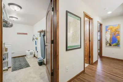 This area shows Laundry, the entrance to the bathroom, and bedroom # 3.