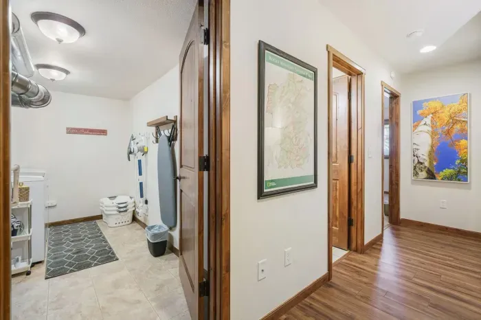 This area shows Laundry, the entrance to the bathroom, and bedroom # 3.