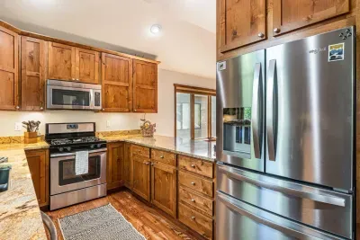Stainless steel appliances and  4 burner gas stove