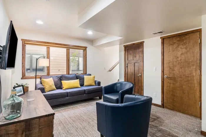 Queen sleeper sofa with memory foam mattress in the lower level family room