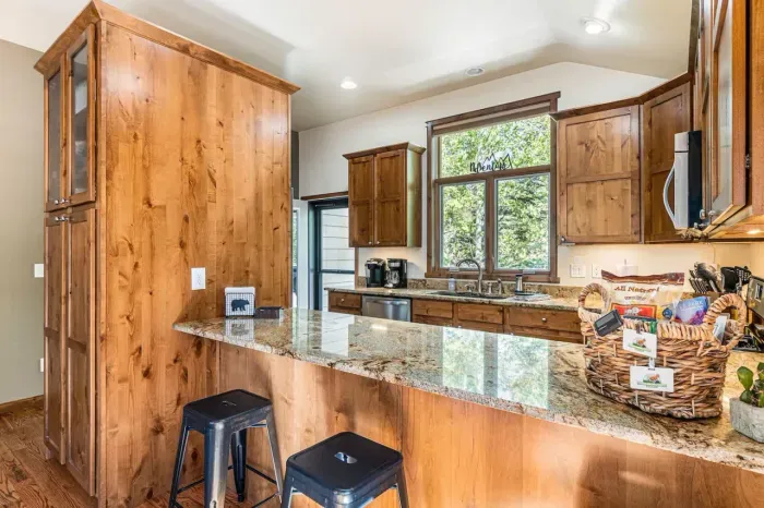 Kitchen with granite counter tops. Welcome basket for each guest.