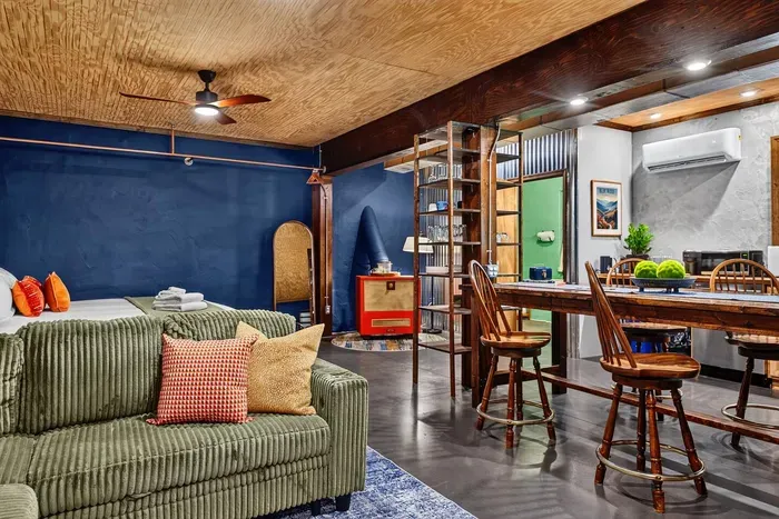 Spacious Garden Suite with a cozy living area, dining space, and fully equipped kitchen.