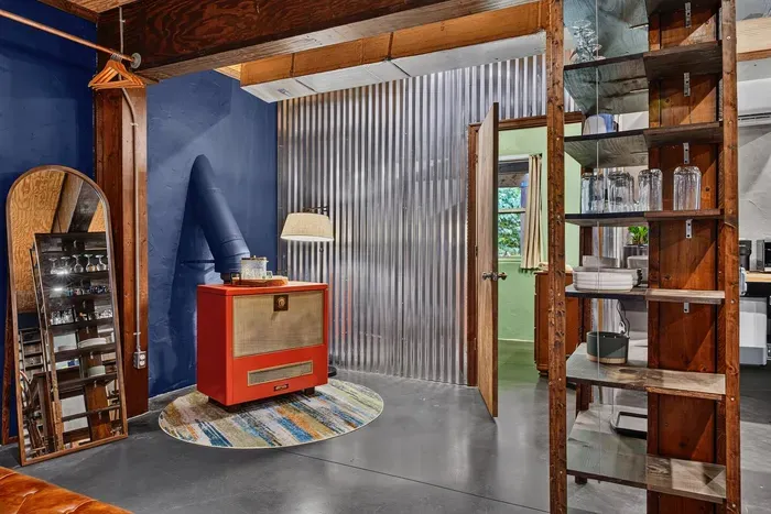 Garden Suite  with a full-length mirror, storage shelves