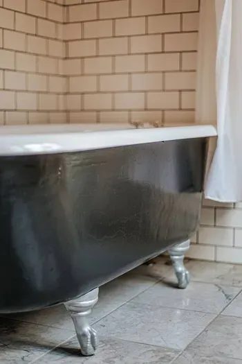 Vintage Soaking Tub: Charming clawfoot-style tub with classic details and a cozy, timeless feel.