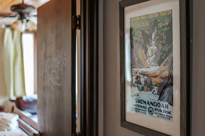 Mountain-Inspired Décor: Rustic artwork adds a cozy, outdoorsy touch throughout the home.
