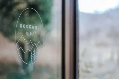 Mountain-Inspired Touch: Scenic “Rockwell Ridge” décor adds a cozy, outdoorsy feel to the home