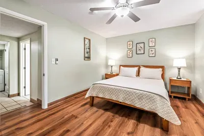 Queen bed. There is a small step up to get to this bedroom from the living room.