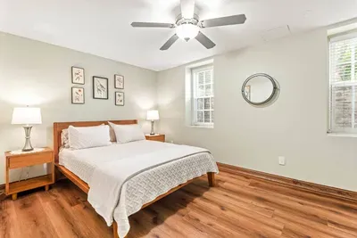 Queen bed. There is a small step up to get to this bedroom from the living room.