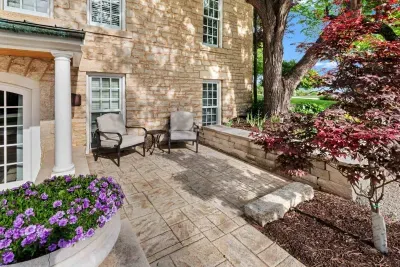 Outdoor seating area to enjoy the beautifully-kept grounds!