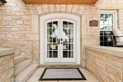 Front door to the Airbnb. There are a handful of stairs to get down to the property entrance.