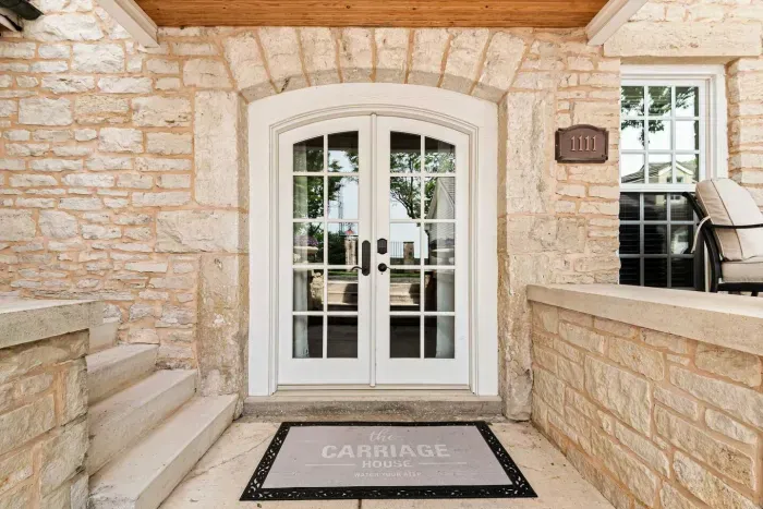 Front door to the Airbnb. There are a handful of stairs to get down to the property entrance.