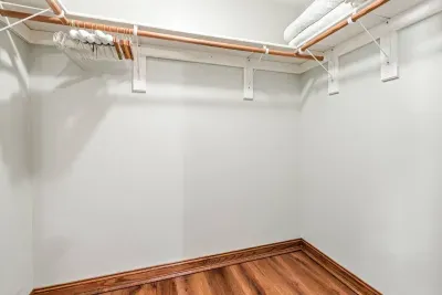 Large, walk in closet off this bedroom to use! Also included with your stay is an iron and ironing board located inside this closet.