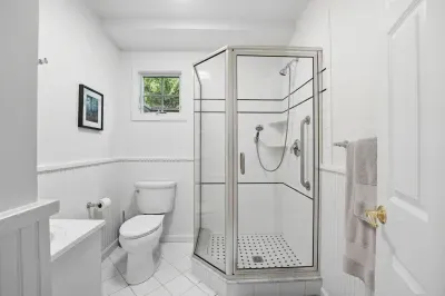 First floor bathroom with stand-up shower. 