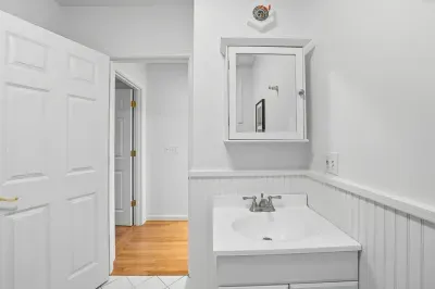 First floor bathroom with stand-up shower. 