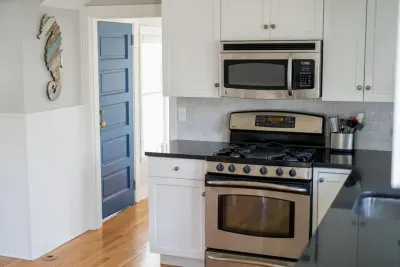 Fully stocked kitchen with tea and coffee.
