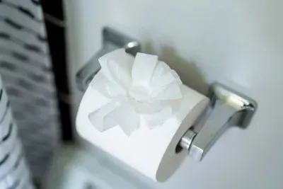 Three rolls of toilet paper supplied per bathroom.