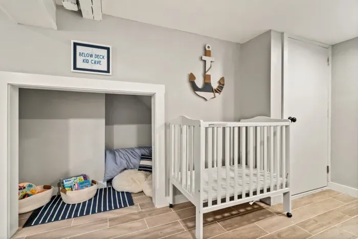 Kids play area & portable crib.
