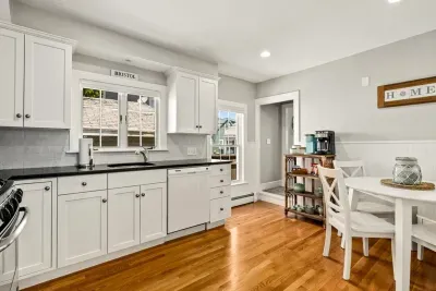 Fully stocked kitchen with tea and coffee.