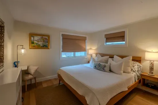 First floor bedroom with a king sized bed.