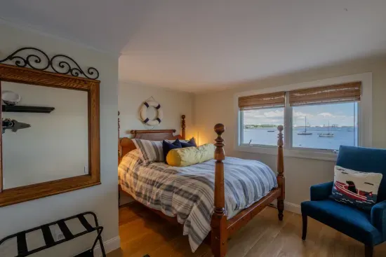 Bedroom #2. Second floor bedroom with a queen size bed and beautiful water views.