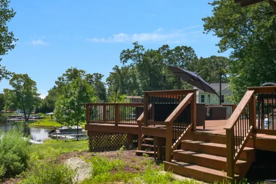 Large deck overlooking the yard and the lake.