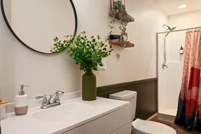 Bright modern bathroom with walk-in shower and stylish decor
