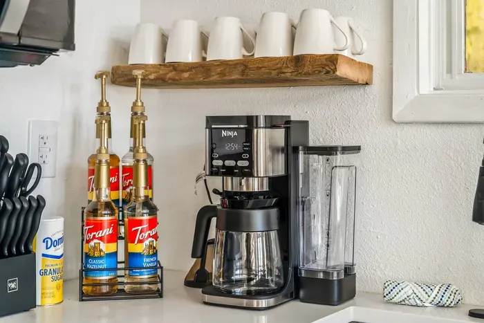Brew your perfect cup with our Ninja coffee bar—complete with syrups, sugar, and mugs for your morning ritual. Whether you’re lakeside lounging or heading out for adventure, start your day with café-style comfort!