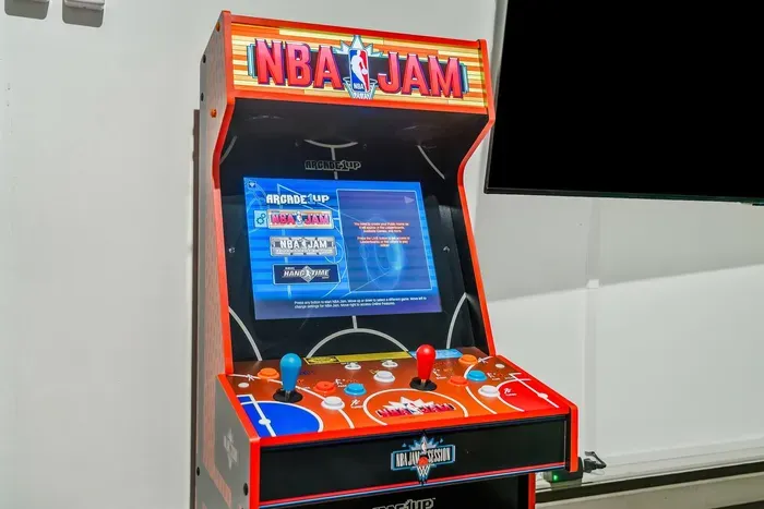 Boomshakalaka! Challenge your crew to a retro showdown on the NBA Jam arcade machine—because vacation memories are made one epic game at a time.