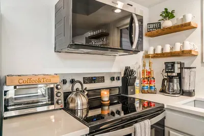 Start your day right with a curated coffee & tea station—complete with syrups, mugs, and all the essentials for your perfect morning ritual or midday pick-me-up.