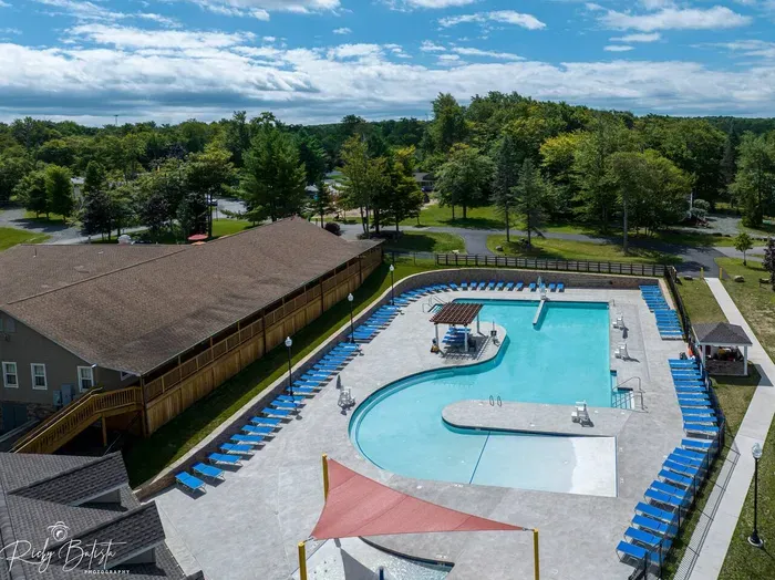Soak up summer at the community’s seasonal outdoor pools—complete with loungers, splash zone, and shaded seating. Optional access available via HOA wristbands for guests who want to dive into the resort-style fun.