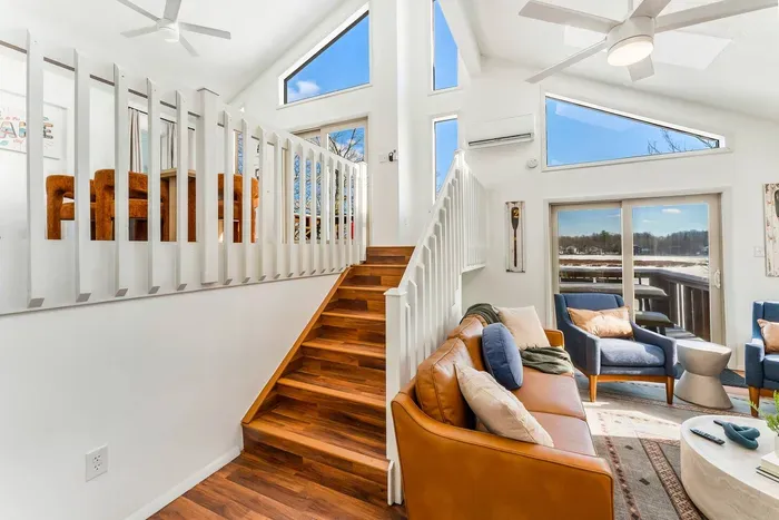 Soaring ceilings, stunning natural light, and modern design details make this space feel open, inviting, and unforgettable—just steps from the loft and full of cozy-chic charm.