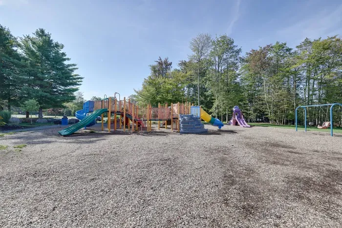 Let the kids run wild! This community playground offers plenty of space to climb, slide, and explore. A great spot for outdoor play and family fun!